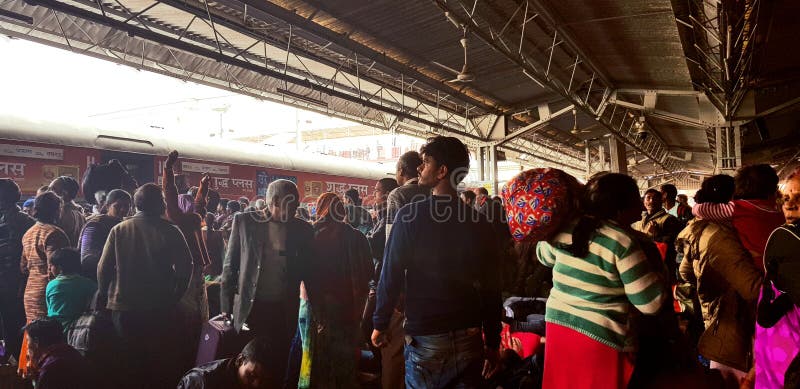 Prayag, India - February 4, 2019: World`s largest religious gathering Kumbh Fair. Millions of Hindu pilgrimages are waiting for the respective train at Prayag railway station. Prayag, India - February 4, 2019: World`s largest religious gathering Kumbh Fair. Millions of Hindu pilgrimages are waiting for the respective train at Prayag railway station.