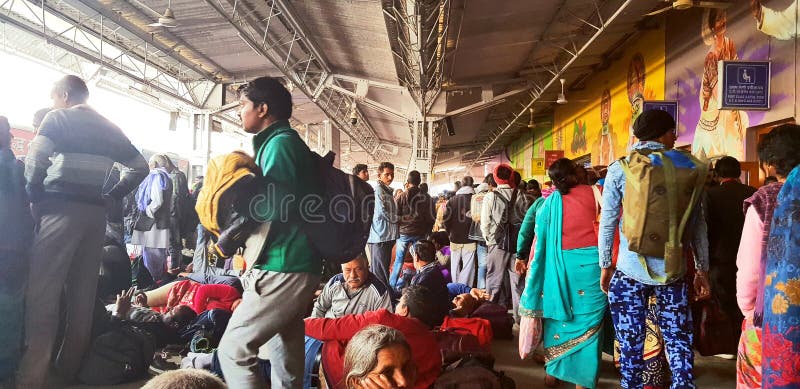 Prayag, India - February 4, 2019: World`s largest religious gathering Kumbh Fair. Millions of Hindu pilgrimages are waiting for the respective train at Prayag railway station. Prayag, India - February 4, 2019: World`s largest religious gathering Kumbh Fair. Millions of Hindu pilgrimages are waiting for the respective train at Prayag railway station.