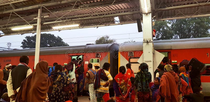 Prayag, India - February 4, 2019: World`s largest religious gathering Kumbh Fair. Millions of Hindu pilgrimages are waiting for the respective train at Prayag railway station. Prayag, India - February 4, 2019: World`s largest religious gathering Kumbh Fair. Millions of Hindu pilgrimages are waiting for the respective train at Prayag railway station.