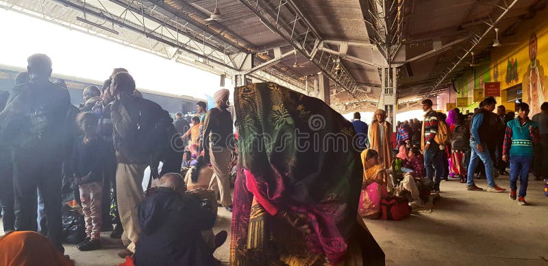 Prayag, India - February 4, 2019: World`s largest religious gathering Kumbh Fair. Millions of Hindu pilgrimages are waiting for the respective train at Prayag railway station. Prayag, India - February 4, 2019: World`s largest religious gathering Kumbh Fair. Millions of Hindu pilgrimages are waiting for the respective train at Prayag railway station.