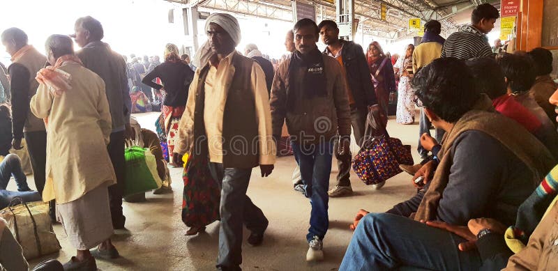 Prayag, India - February 4, 2019: World`s largest religious gathering Kumbh Fair. Millions of Hindu pilgrimages are waiting for the respective train at Prayag railway station. Prayag, India - February 4, 2019: World`s largest religious gathering Kumbh Fair. Millions of Hindu pilgrimages are waiting for the respective train at Prayag railway station.