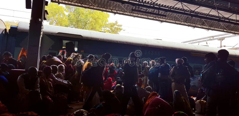 Prayag, India - February 4, 2019: World`s largest religious gathering Kumbh Fair. Millions of Hindu pilgrimages are waiting for the respective train at Prayag railway station. Prayag, India - February 4, 2019: World`s largest religious gathering Kumbh Fair. Millions of Hindu pilgrimages are waiting for the respective train at Prayag railway station.