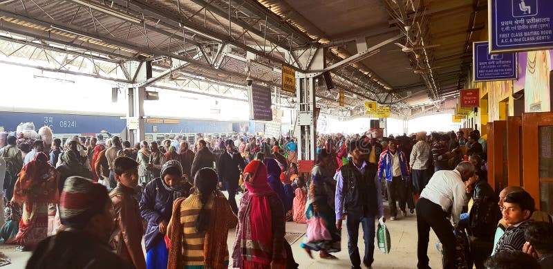 Prayag, India - February 4, 2019: World`s largest religious gathering Kumbh Fair. Millions of Hindu pilgrimages are waiting for the respective train at Prayag railway station. Prayag, India - February 4, 2019: World`s largest religious gathering Kumbh Fair. Millions of Hindu pilgrimages are waiting for the respective train at Prayag railway station.