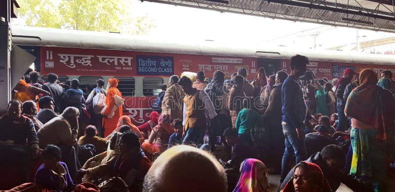 Prayag, India - February 4, 2019: World`s largest religious gathering Kumbh Fair. Millions of Hindu pilgrimages are waiting for the respective train at Prayag railway station. Prayag, India - February 4, 2019: World`s largest religious gathering Kumbh Fair. Millions of Hindu pilgrimages are waiting for the respective train at Prayag railway station.