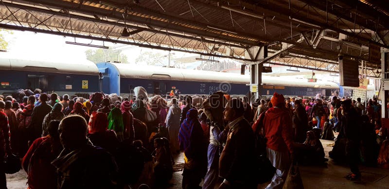 Prayag, India - February 4, 2019: World`s largest religious gathering Kumbh Fair. Millions of Hindu pilgrimages are waiting for the respective train at Prayag railway station. Prayag, India - February 4, 2019: World`s largest religious gathering Kumbh Fair. Millions of Hindu pilgrimages are waiting for the respective train at Prayag railway station.