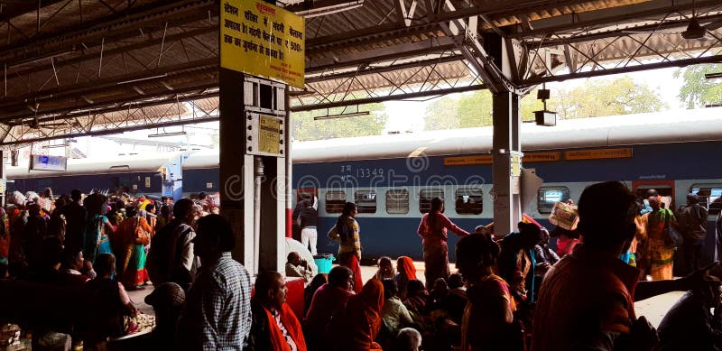 Prayag, India - February 4, 2019: World`s largest religious gathering Kumbh Fair. Millions of Hindu pilgrimages are waiting for the respective train at Prayag railway station. Prayag, India - February 4, 2019: World`s largest religious gathering Kumbh Fair. Millions of Hindu pilgrimages are waiting for the respective train at Prayag railway station.