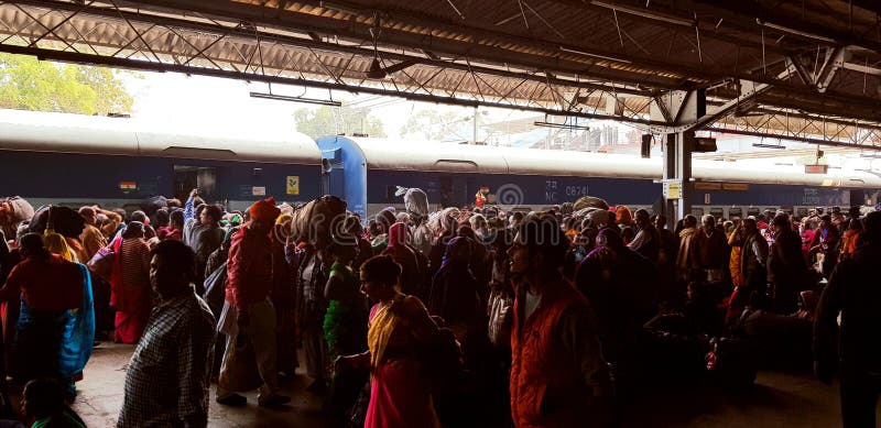 Prayag, India - February 4, 2019: World`s largest religious gathering Kumbh Fair. Millions of Hindu pilgrimages are waiting for the respective train at Prayag railway station. Prayag, India - February 4, 2019: World`s largest religious gathering Kumbh Fair. Millions of Hindu pilgrimages are waiting for the respective train at Prayag railway station.