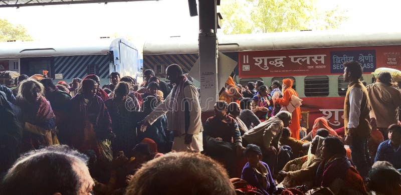 Prayag, India - February 4, 2019: World`s largest religious gathering Kumbh Fair. Millions of Hindu pilgrimages are waiting for the respective train at Prayag railway station. Prayag, India - February 4, 2019: World`s largest religious gathering Kumbh Fair. Millions of Hindu pilgrimages are waiting for the respective train at Prayag railway station.