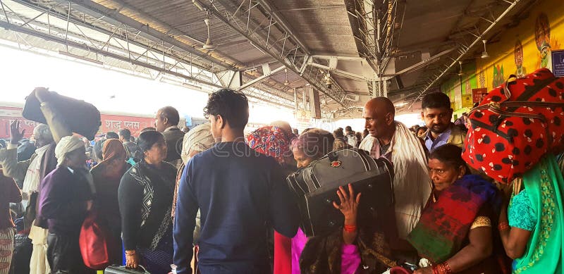 Prayag, India - February 4, 2019: World`s largest religious gathering Kumbh Fair. Millions of Hindu pilgrimages are waiting for the respective train at Prayag railway station. Prayag, India - February 4, 2019: World`s largest religious gathering Kumbh Fair. Millions of Hindu pilgrimages are waiting for the respective train at Prayag railway station.