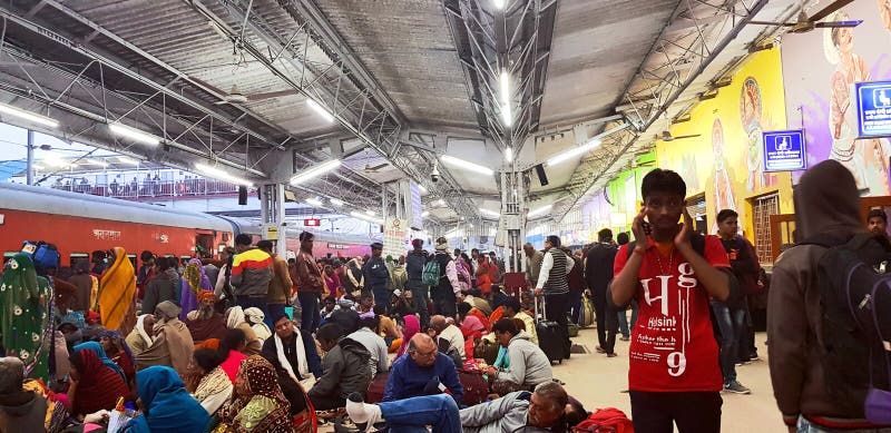 Prayag, India - February 4, 2019: World`s largest religious gathering Kumbh Fair. Millions of Hindu pilgrimages are waiting for the respective train at Prayag railway station. Prayag, India - February 4, 2019: World`s largest religious gathering Kumbh Fair. Millions of Hindu pilgrimages are waiting for the respective train at Prayag railway station.