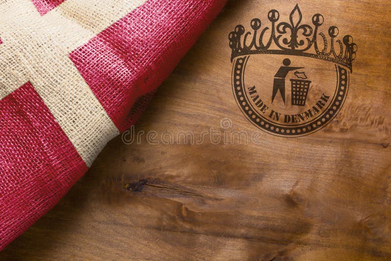 Feito em Dinamarca com a bandeira nacional imagem de stock Feito em Dinamarca com a bandeira nacional imagem de stock