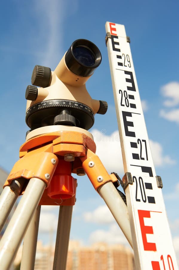 Surveyor equipmant kit - level and E-bar outdoors. Surveyor equipmant kit - level and E-bar outdoors