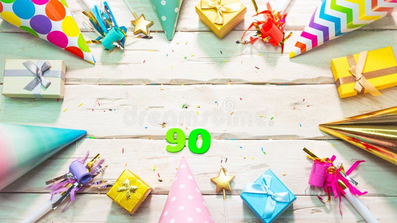 Beautiful colorful greeting card on the background of white boards happy birthday copy space. Beautiful ornaments and decorations festive background. Happy birthday number 90. Beautiful colorful greeting card on the background of white boards happy birthday copy space. Beautiful ornaments and decorations festive background. Happy birthday number 90