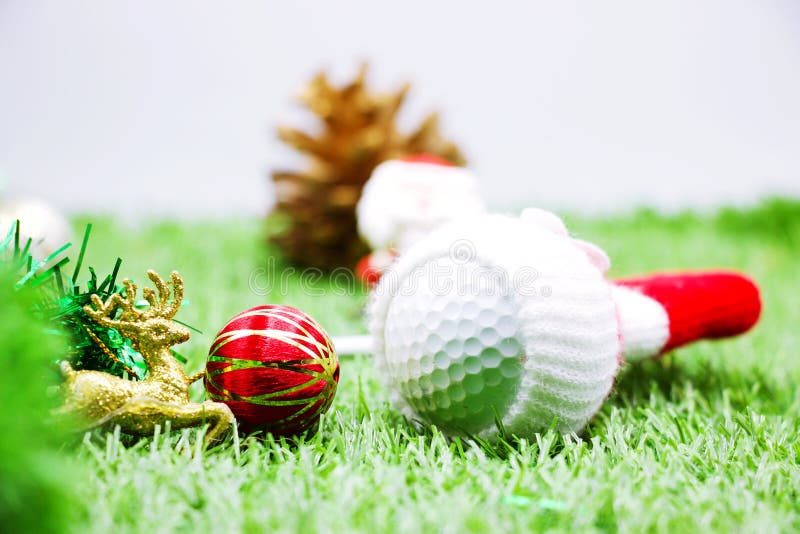 Golf ball with Christmas decoration for golfer during Christmas holiday. Golf ball with Christmas decoration for golfer during Christmas holiday