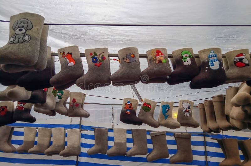 Felt boots on market stand. Valenki are traditional Russian winter footwear