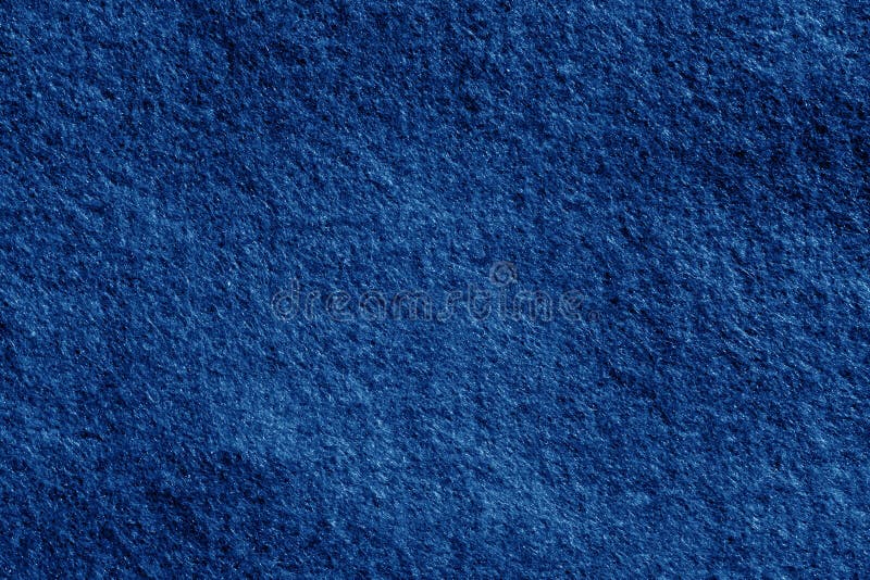 Felt texture background in navy blue color. Stock Photo