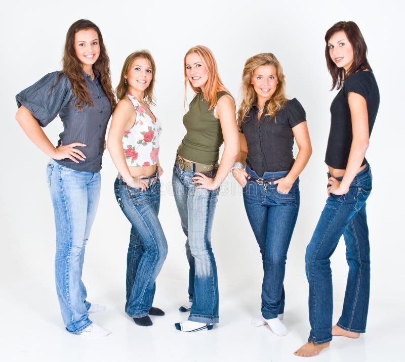 Five women posing in a casual group photo. Five women posing in a casual group photo.