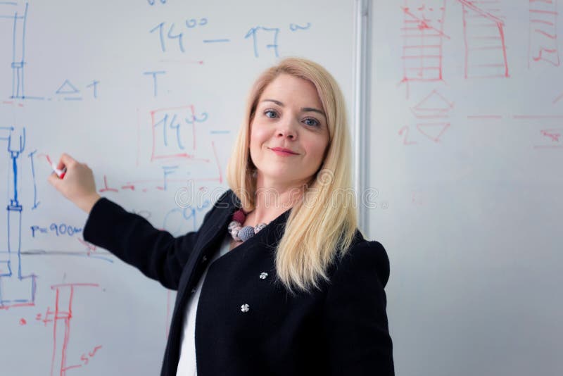 Female Architecture Teacher at Work. Female Professor Explain Architectural Projects To Students