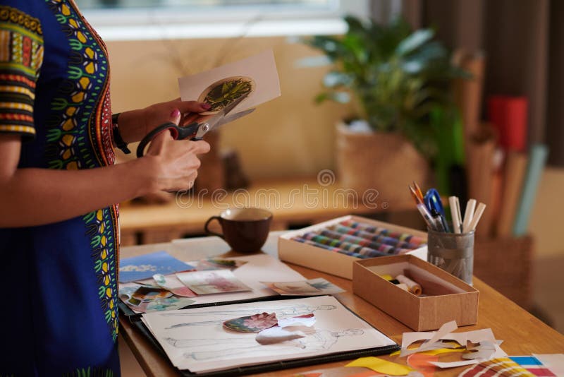 Female Artist Cutting Out Pictures Stock Photo - Image of photograph ...