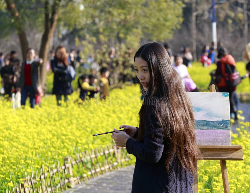 Female Artist Painting in Field Editorial Photo - Image of draft, brush