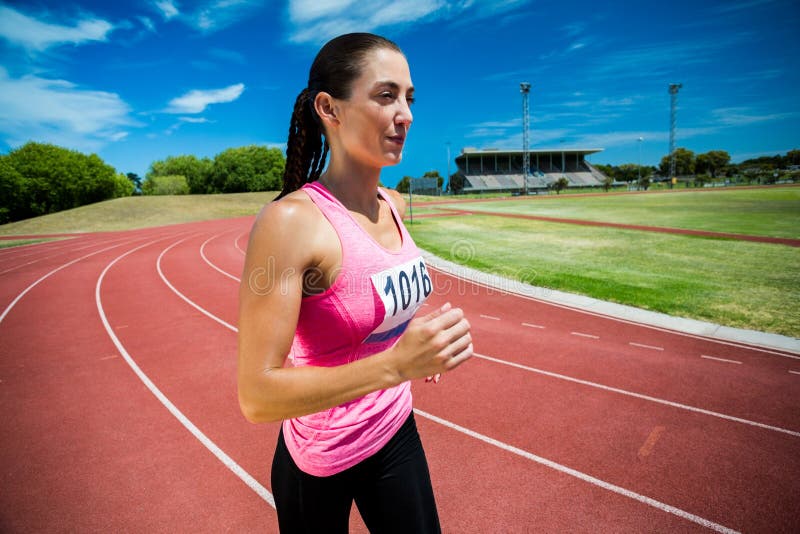 Female Athlete Running on the Running Track Stock Photo Image of