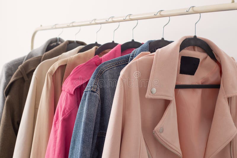Female Autumn Clothes on Hangers in White Room Stock Image Image of