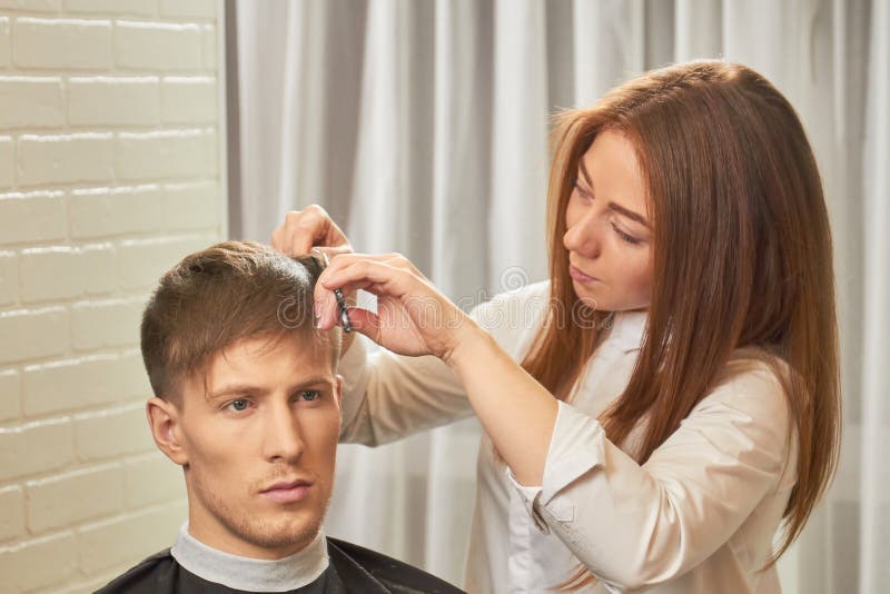 Female Barber Cutting Hair. Stock Image - Image of comb, people: 100151763