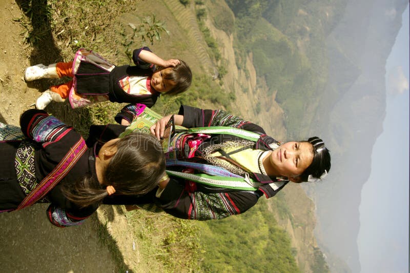 Female black and ethnic Hmong with childrens