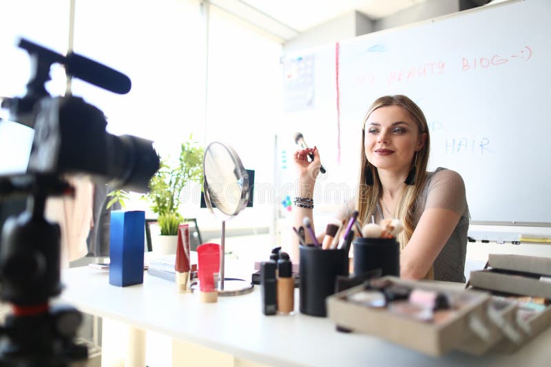 Female Blogger Filming Makeup Beauty Tutorial royalty free stock photography Female Blogger Filming Makeup Beauty Tutorial royalty free stock photography