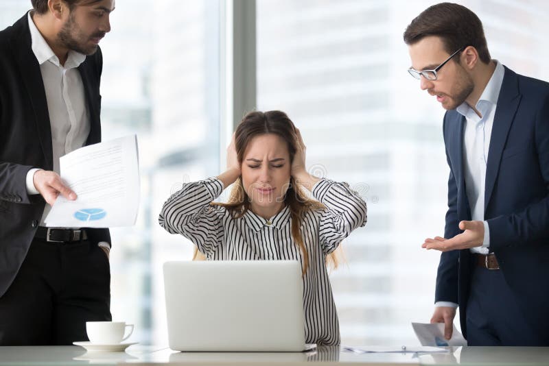 Female boss in despair abstracting from work closing ears