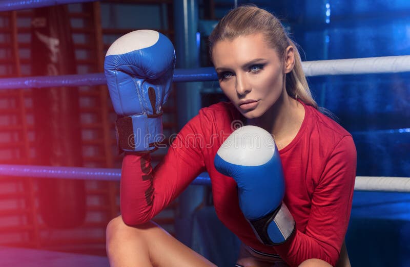 Female Boxer Posing Inside a Boxing Ring. Stock Photo - Image of ...