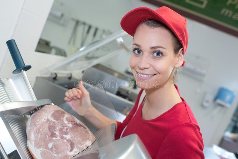 Female Butcher Cutting Meat on Machine Stock Photo Image of organic
