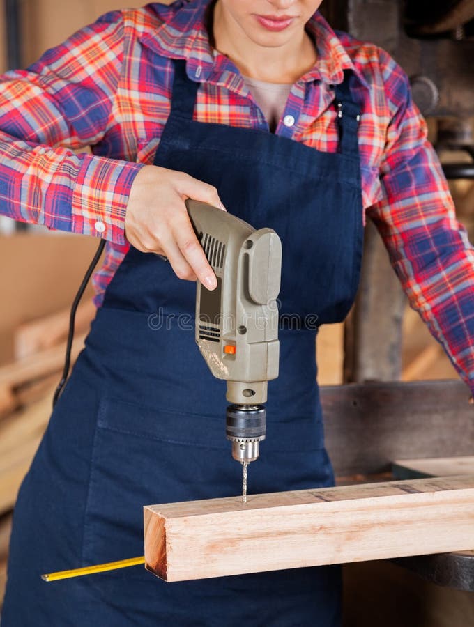 Female Carpenter Cutting Wood with Tablesaw Stock Photo Image of instrument, caucasian 45172580