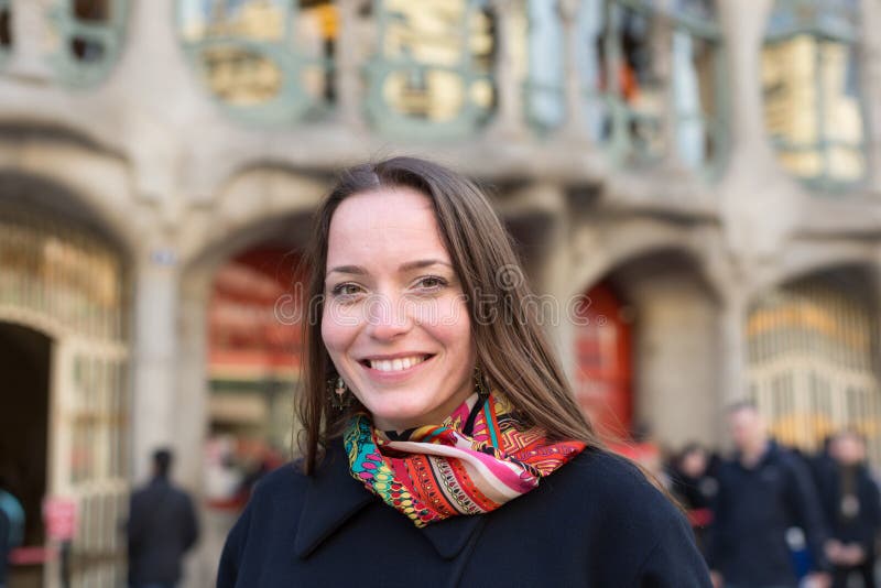 Female with Casa Batllo in background stock photography Female with Casa Batllo in background stock photography