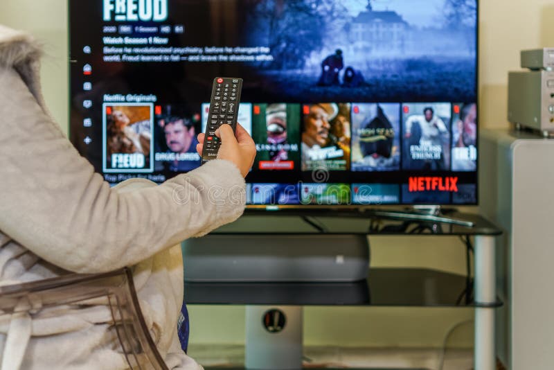 Watching on TV Netflix Streaming Service VoD Content. Editorial Stock