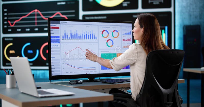Female Caucasian Strategist Analyzing Real Time Business Data royalty free stock photography