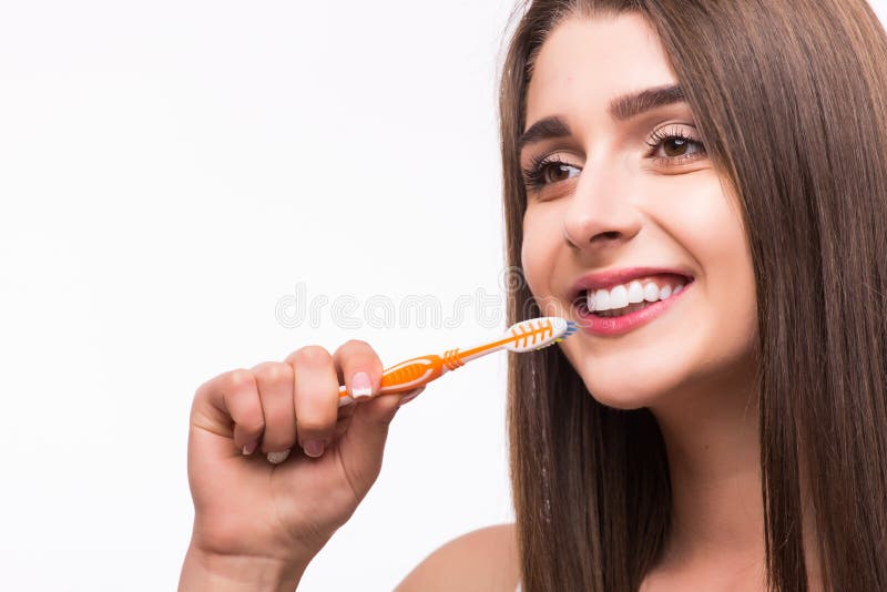 Closeup portrait of attractive female clean teeth in the bathroom, dental clinic, dentistry health care, healthy lifestyle, tooth whitening concept