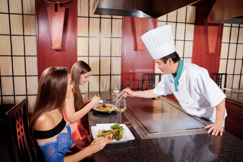 Female clients in Japanese restaurant royalty free stock image Female clients in Japanese restaurant royalty free stock image