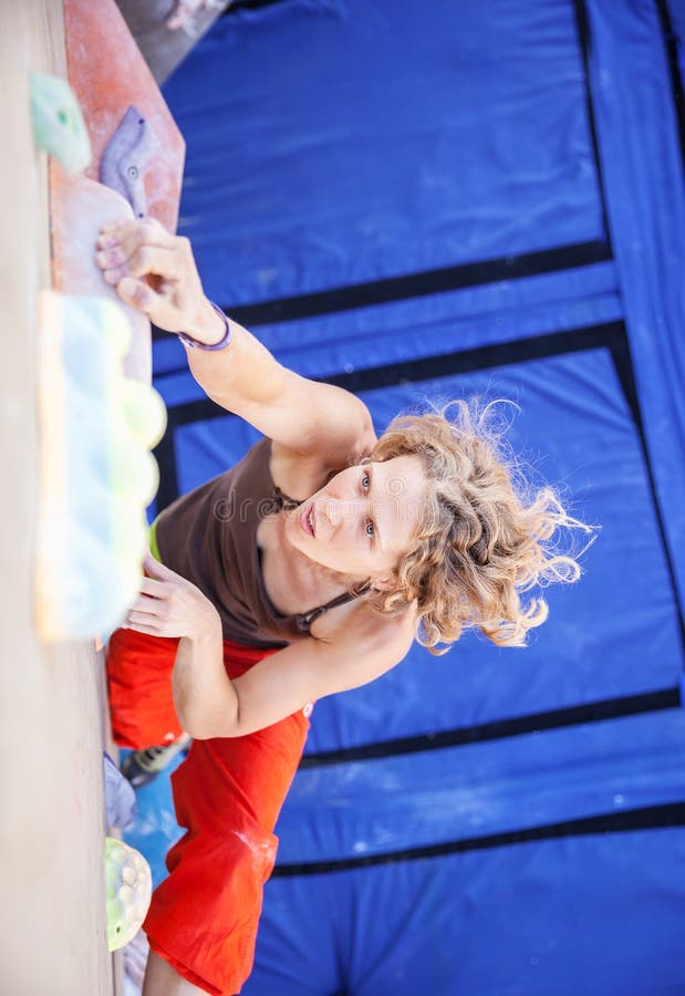 Female Climber on Climbing Wall Stock Photo Image of activity, grip