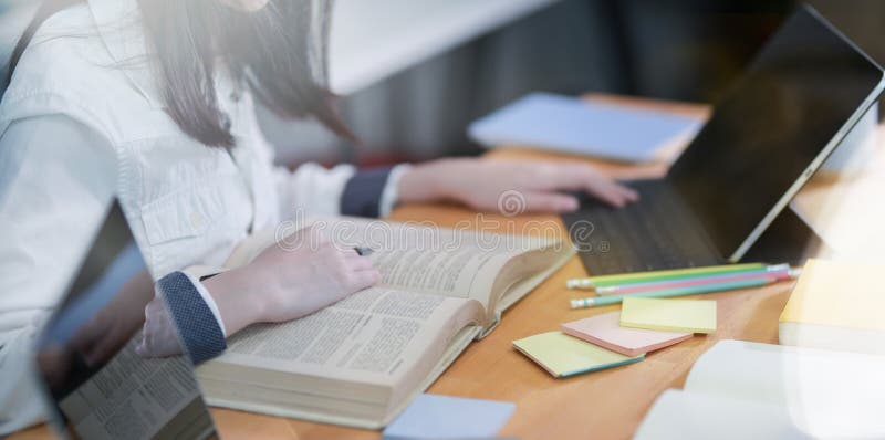 Female college student working on academic research