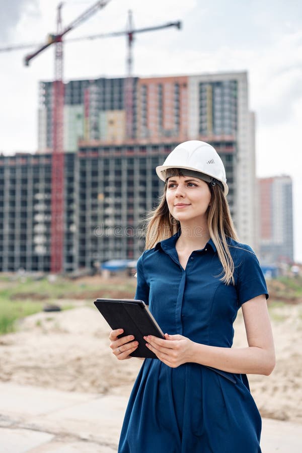 Female Construction Engineer. Architect with a Tablet Computer at a ...
