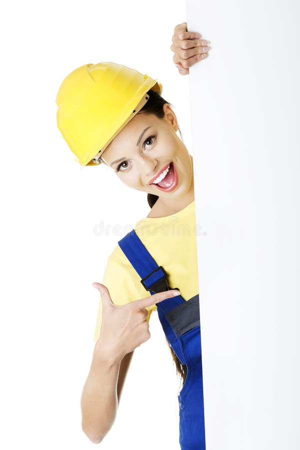 Female construction worker with blank board