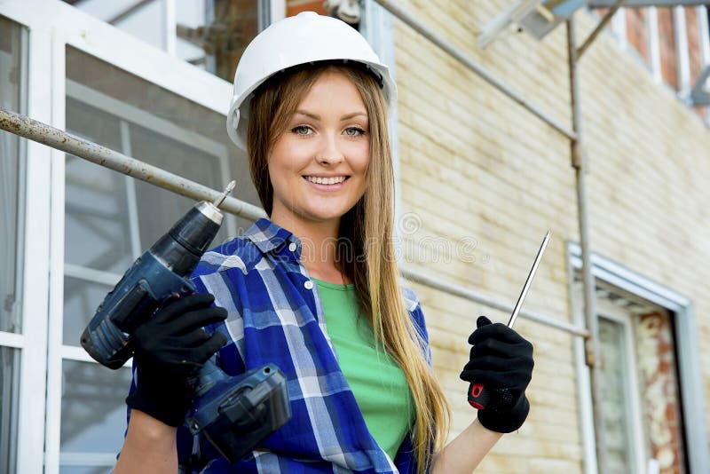 Female construction worker stock image. Image of female 103353149