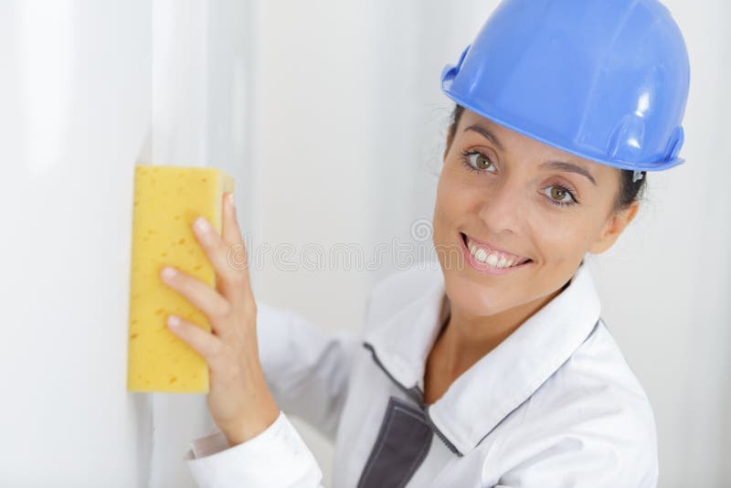 Female Construction Workers Washing Wall Stock Image Image of architecture, builder 197918259