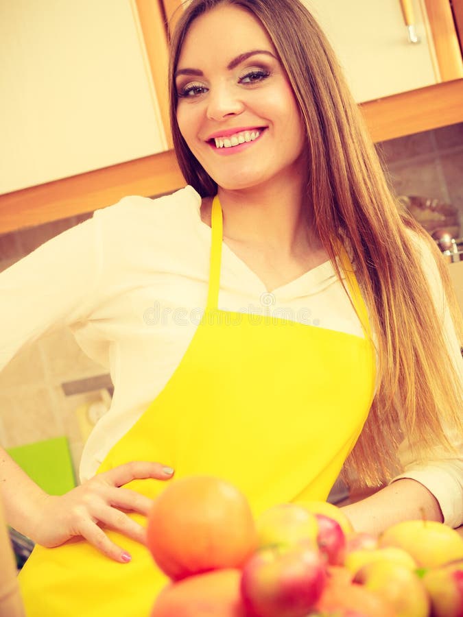 Female cook working in kitchen stock images Female cook working in kitchen stock images