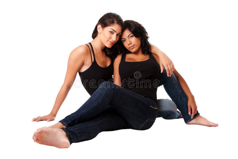 Female couple sitting together stock image Female couple sitting together stock image