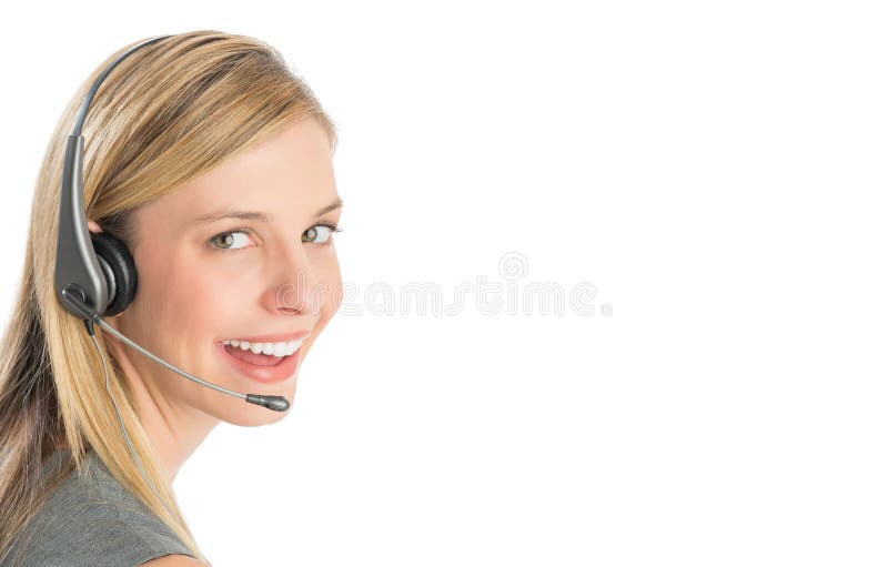 Close-up portrait of happy female customer service representative wearing headset isolated over white background