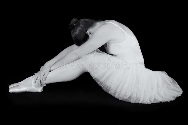 female-dancer-sit-floor-looking-sad-artistic-conversion-38071762.jpg
