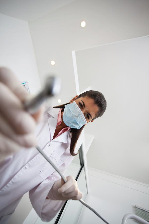 Female Dentist Holding Drill Stock Image Image of adult, clinic 36408555