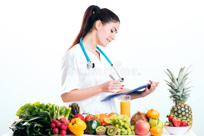 Female dietitian in uniform with stethoscope stock images